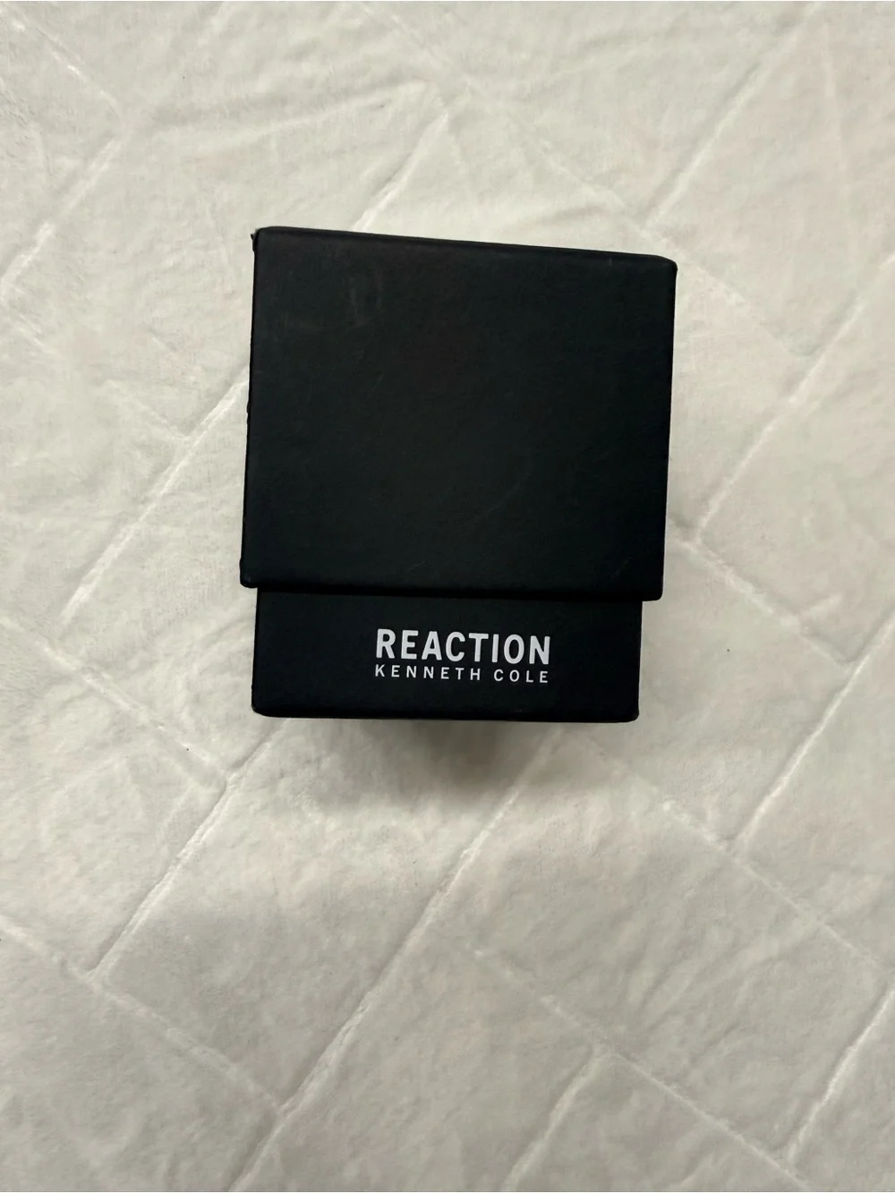 Kenneth Cole Black Dial Watch with Orange Accent